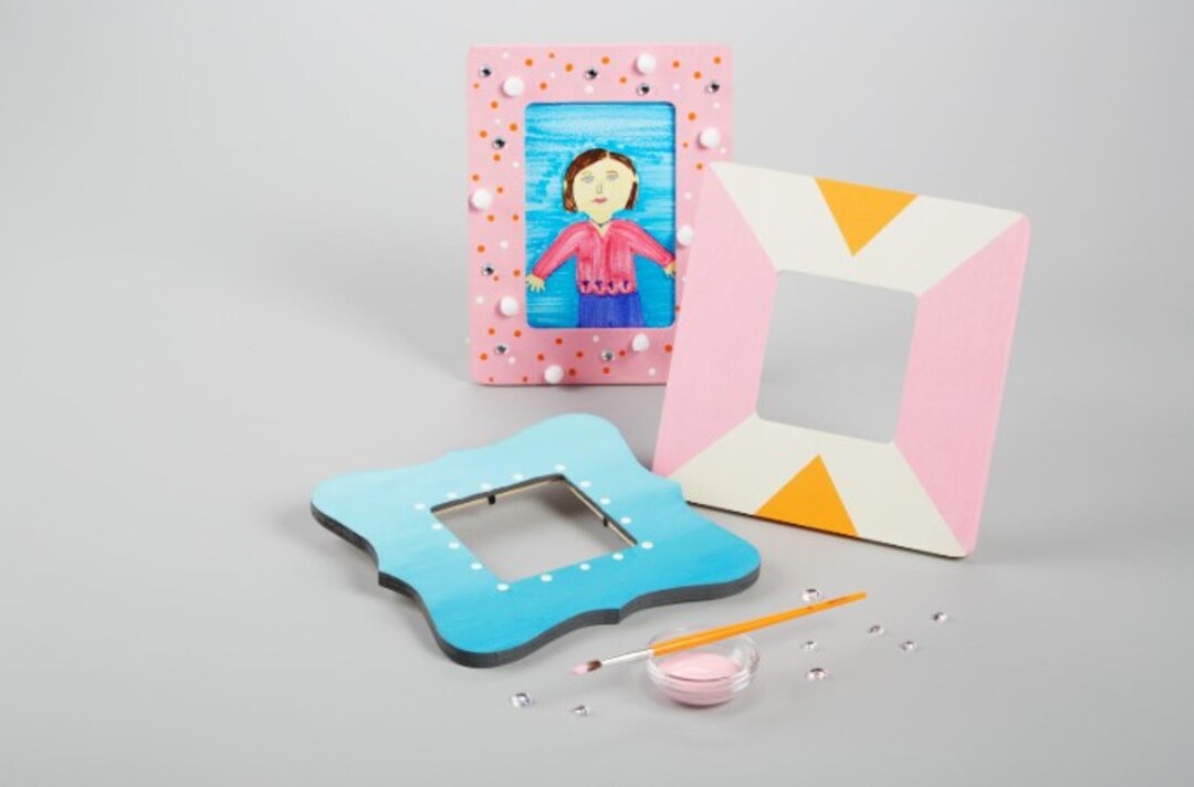 handmade frame for mom on table with paint brush